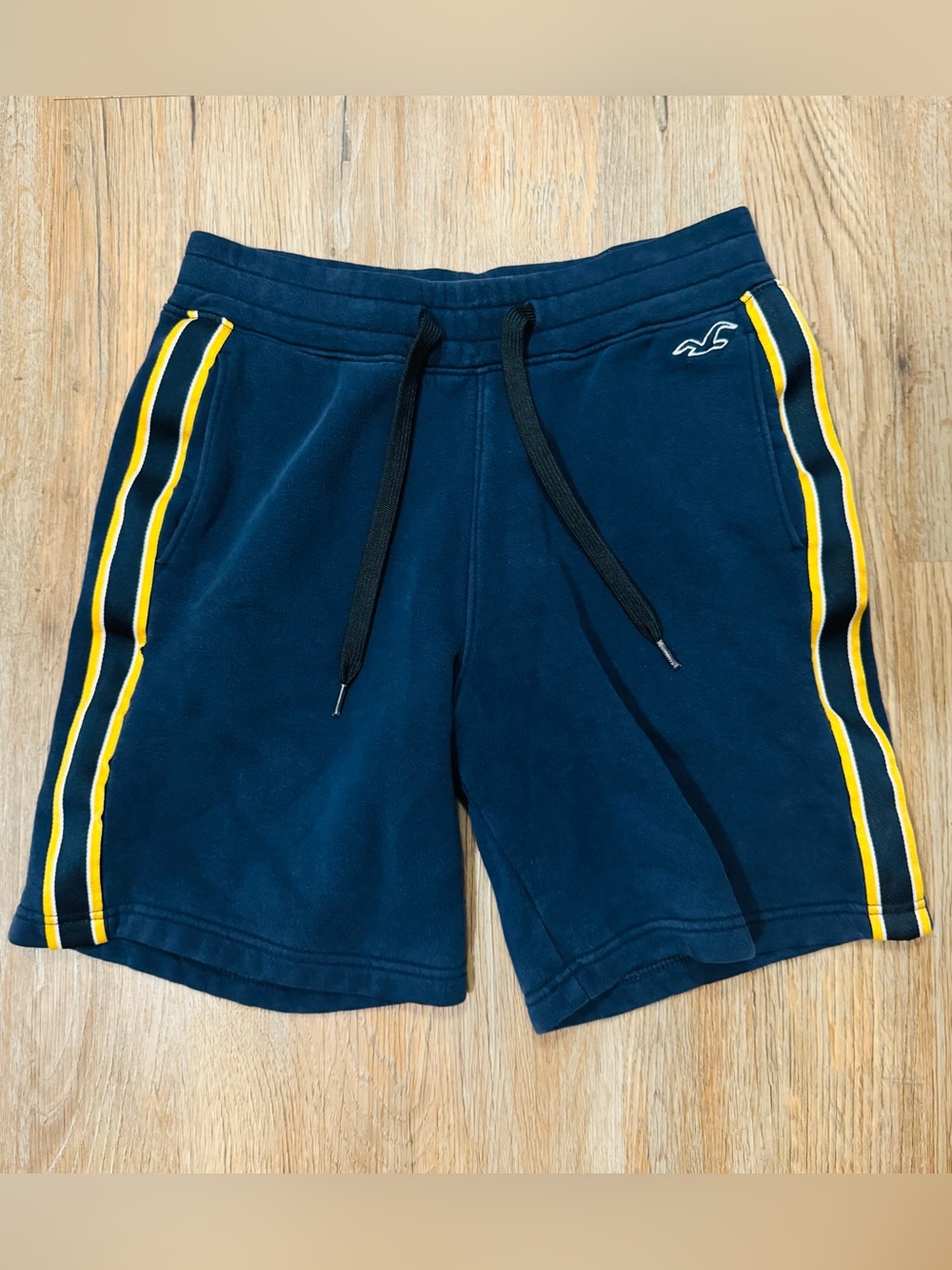 Hollister Navy Athletic Shorts with Yellow Side Stripes
